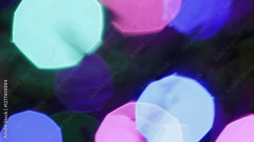 Poster colorful bokeh lights with various shapes against a dark background, capturing a festive and abstrac