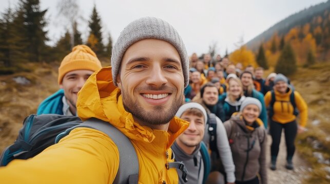 Happy friends enjoying a group selfie during an outdoor adventure trip