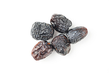 Dates fruit ajwa or kurma ajwa, isolated on white background