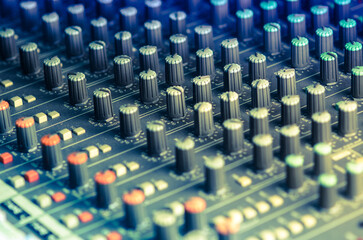 Close-up  sound mixer in studio for sound record control