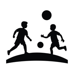 Silhouette of two boys playing soccer with balls on a hill