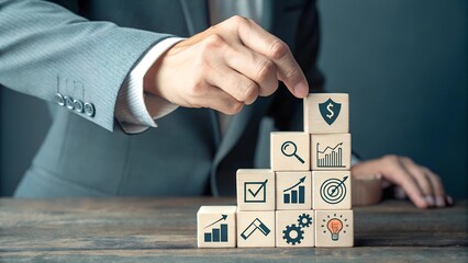 Businessman hand pulling out or placing wood, Building corporate governance structure, Business man building a project, Businessman stacking wooden block