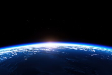 Obraz premium View of the Earth from Space with Sunrise and Blue Glow on the Horizon