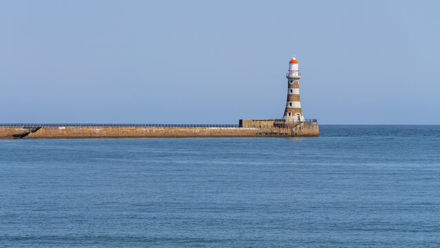 Fototapeta The Lighthouse and pier in Roker, England, UK