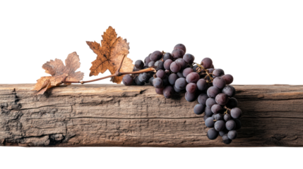 A close-up of fresh, ripe grapes resting on a rustic wooden surface. The scene captures the natural beauty and vibrant colors of seasonal produce.