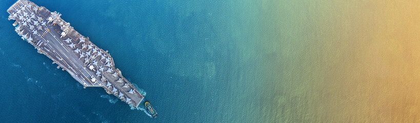 Nuclear war ship, Navy ship, Military navy. nuclear carrier running in the ocean. Military navy ship carrier full loading fighter jet aircraft for prepare troops.