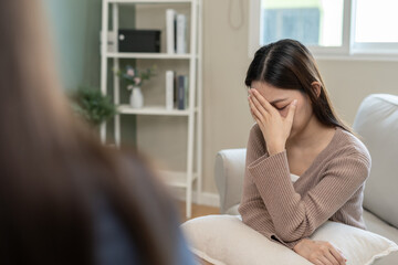 Fototapeta premium woman with mental health problems is consulting. psychiatrist is recording the patient's condition for treatment. encouragement, love and family problem, bipolar , depression patient, protect suicide