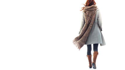 A woman walks away in a stylish outfit with a cozy scarf, embracing a sense of calm and comfort in her daily commute, perfect for lifestyle imagery.