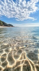 Dynamic ripples on a crystal-clear ocean surface, peaceful waters. Vertical