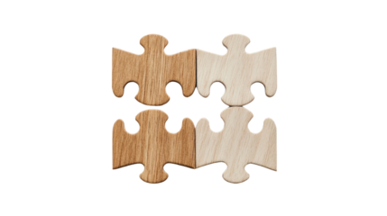 Puzzle Pieces of Teamwork: Four interlocking wooden puzzle pieces, symbolizing unity and collaboration, form a perfect fit, representing problem-solving and business solutions.