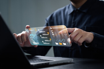 AI content creation tools: Man uses laptop with AI assistant for graphic design, translation, chatbot, image creation, coding, and advertising.