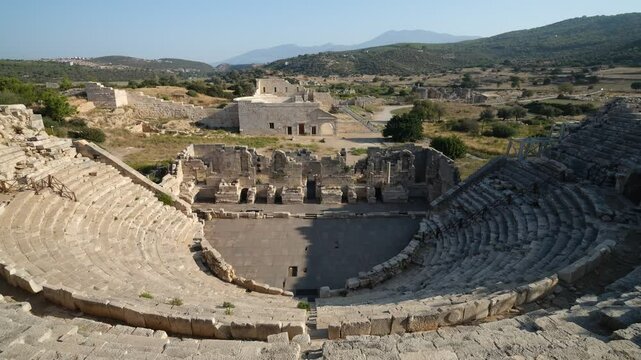 The ruins of the ancient city of Patara. Morning view in the ancient theatre. Mediterranean region  Kas district, Antalya province, Turkey - 4K video 