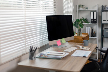 Computer monitor, screen isolated on white background at workplace office room with decorations and copy space modern 
