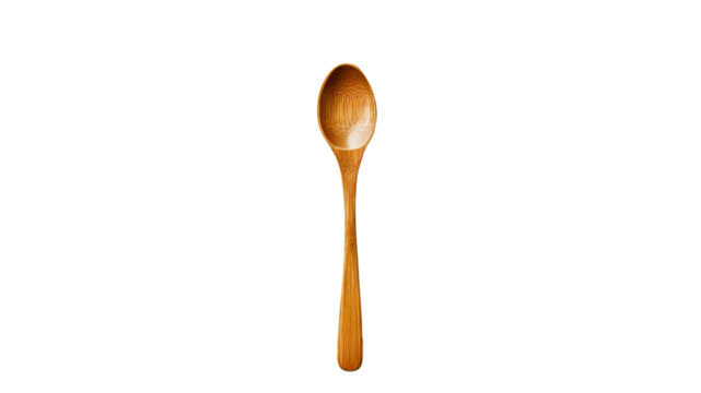 Wooden spoon placed against a plain background