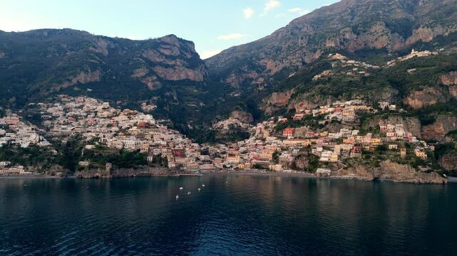 Drone aerial cinematic wide angle view of Conca dei Marini town in the province of Salerno in the Campania Italy. It is situated on a hill close to the coast and between Amalfi and Furore.