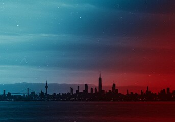 Urban design element: city skyline silhouette in black, set against a striking, horizontally-oriented gradient sky