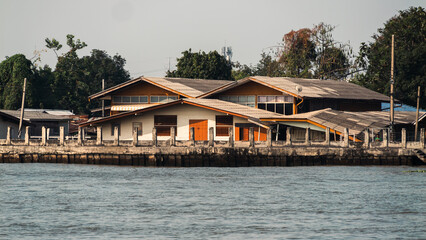 Fototapeta premium Coastal waterfront architecture tranquil riverbank building scenic captivating concept