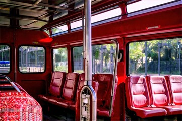 Fototapeta premium A modern red tourist bus in PNG format, perfect for design projects and digital graphics. 