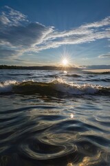 Vibrant Landscape with a Brilliant Blue Sky and Reflective Rippling Water
