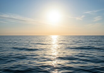 Fototapeta premium Tranquil ocean sunset with clear skies and calm waves