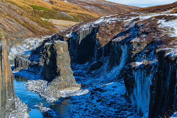 The basalt columns at Studlagil Canyon, at the east region of Iceland, winter time.