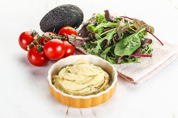 Creamy hummus in the bowl
