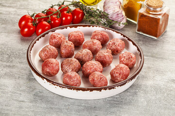 Uncooked raw beef meatball minced