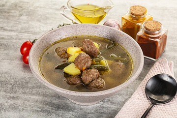 Soup with meatball and potato