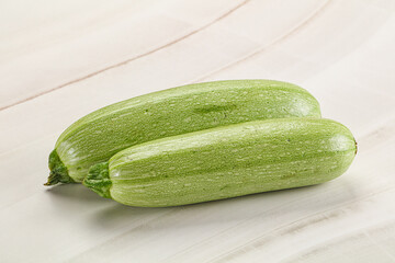 Raw green ripe zucchini vegetable