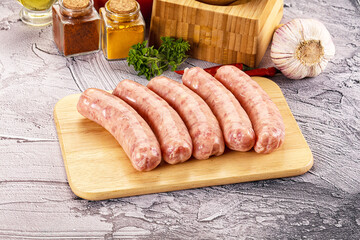 Raw meat sausages for grill