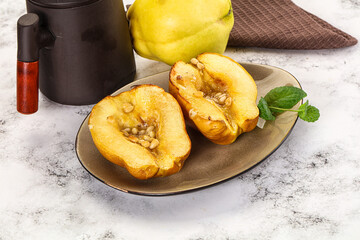 Baked quince with honey and cedar