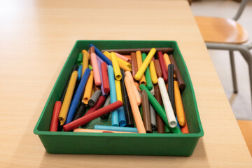 Colorful Collection of Markers in Green Tray