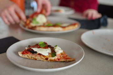 Piece of homemade pizza on the plate