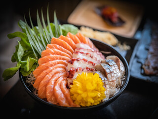 Sashimi Sushi Set on Plate Delicious sashimi bowl with fresh fish and octopus.