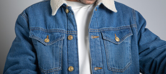 Man wearing denim winter jacket. Fashion