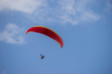 Paragliding over the clouds sunset view at Bir Billing Himachal Pradesh India. Clouds in the sky