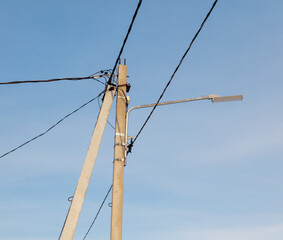 A tall pole with a light on top of it