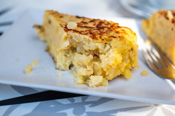 slice of spanish tortilla or omlette - typical tapa from spain
