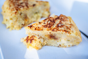slice of spanish tortilla or omlette - typical tapa from spain