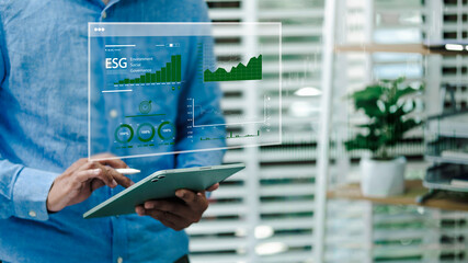 Businessman presenting green business concept, ESG, environment, social and governance on virtual...