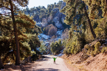 boy with a backpack in the forest.  hiking and traveling.