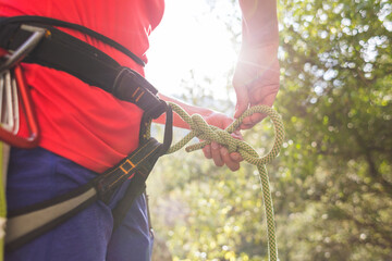 climber tied to a rope
