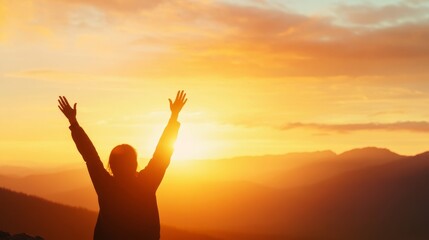 Silhouette of an individual embracing nature's beauty at sunset in the mountains, symbolizing freedom, Earth Day concept
