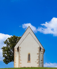The Church of St. Andrew in Kamešnica, dating back to the 14th century, has preserved its original Gothic appearance with a steep double-pitched roof.