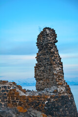 Abandoned castle. Castle ruins. Destroyed walls of an old fort. Old architecture.