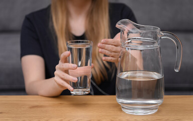young woman drinking alcohol