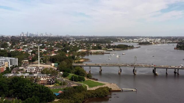Parramatta river in Western Sydney city of Ryde residential suburbs &ndash; aerial 4k.
