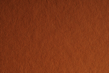 Macro close-up of brown felt material texture background