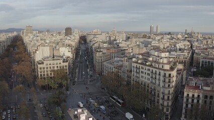 Obraz premium Panoramic bird's-eye view of Barcelona. Drone movement over a busy road junction in the city center