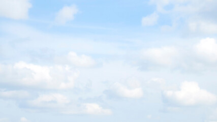 Blue sky pastel with white cloud. Cumulus clouds. Cloudscape blur background. Beautiful sky in the morning. Freedom of life, New life beginning and Positive thought and energy concepts.